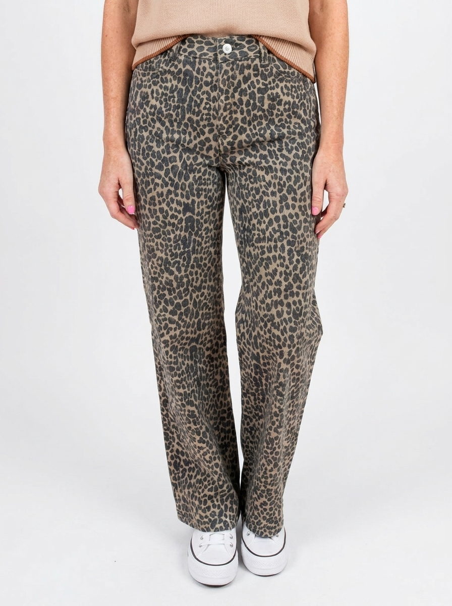 Leopard print straight leg pants on a white backdrop